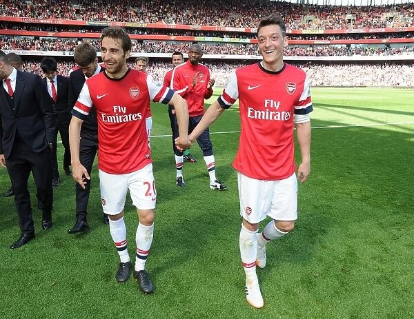 Arsenal: Flamini and Ozil Celebrate Victory over West Bromwich Albion (2013-14)