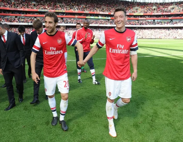 Framed Print : Arsenal: Flamini and Ozil Celebrate Victory over West Bromwich Albion (2013-14) Framed Print : Arsenal: Flamini and Ozil Celebrate Victory over West Bromwich Albion (2013-14)