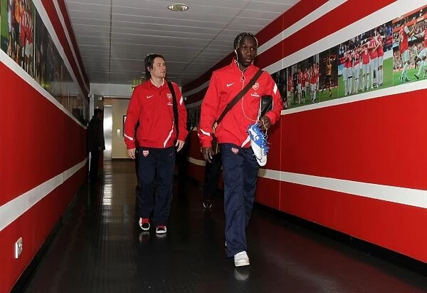 Arsenal Football Club: Bacary Sagna and Tomas Rosicky Approaching Emirates Stadium for FA Cup Match vs. Aston Villa