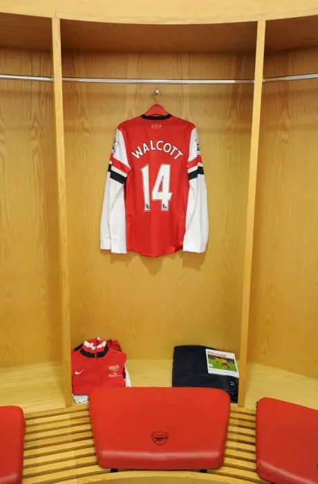 Framed Print : Arsenal Football Club: Theo Walcott in the Changing Room before Arsenal vs Fulham (2012-13)