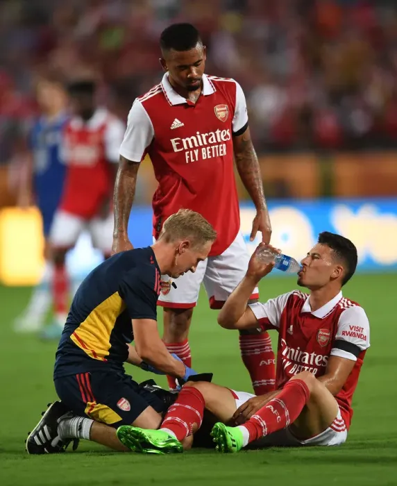 Framed Print : Arsenal: Gabriel Martinelli Receives Treatment as Arsenal Face Chelsea in Florida Cup Framed Print : Arsenal: Gabriel Martinelli Receives Treatment as Arsenal Face Chelsea in Florida Cup