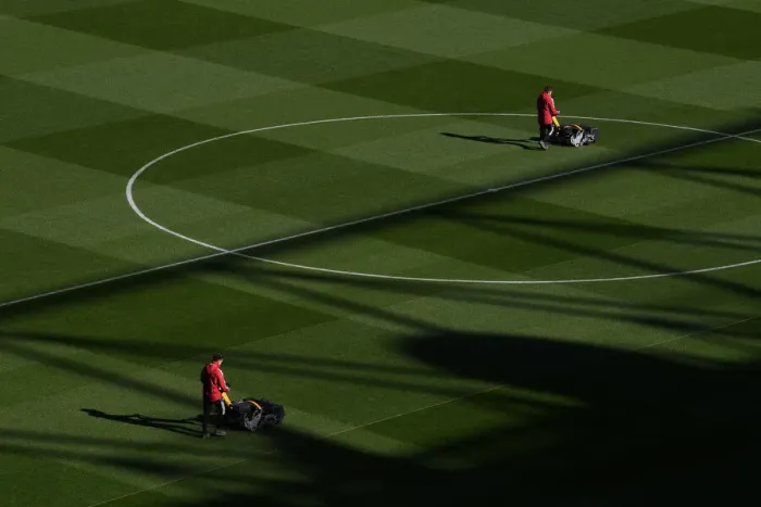 Framed Print : Arsenal: Gameday Preparation - The Emirates Stadium Groundsmen at Work (2021-22) (Arsenal vs Aston Villa)