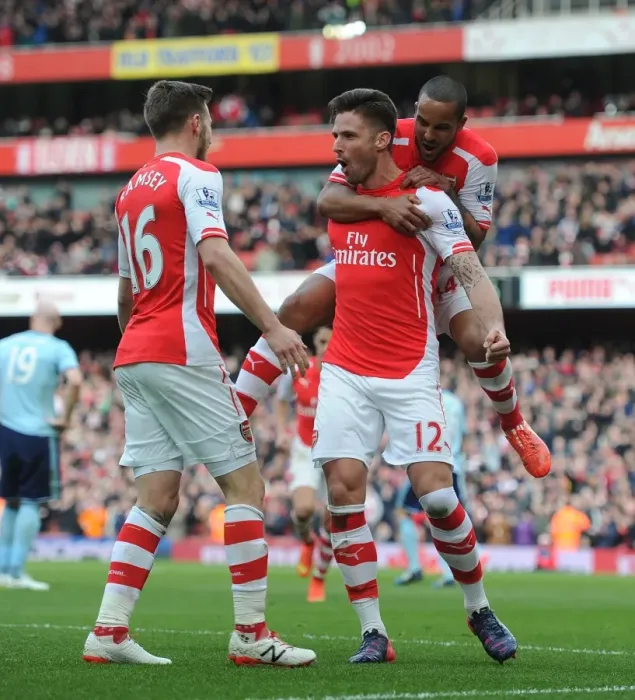 Framed Print : Arsenal: Giroud's Goal Celebration with Ramsey and Walcott vs West Ham United (2015)