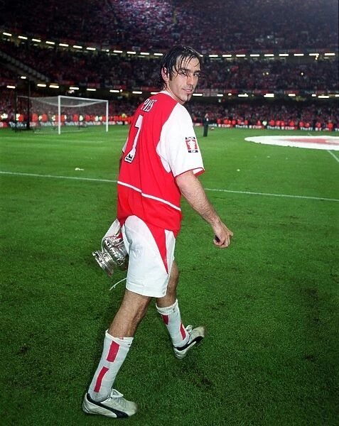 Arsenal goalscorer Robert Pires with the F.A. Cup