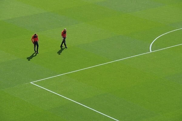 Arsenal Grounds Team Preparing Emirates Stadium Pitch for Arsenal vs West Bromwich Albion (2015-16)