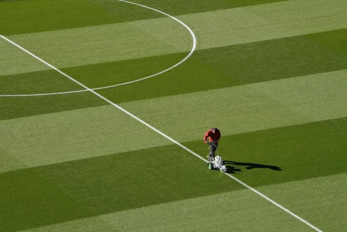 Framed Print : Arsenal Groundsman Meticulously Prepares Emirates Stadium Pitch for Carabao Cup Match Framed Print : Arsenal Groundsman Meticulously Prepares Emirates Stadium Pitch for Carabao Cup Match