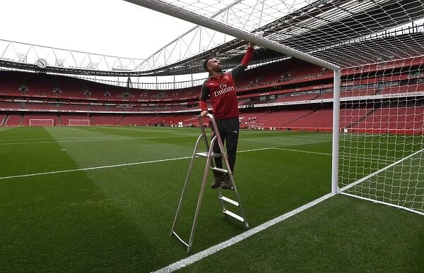 Arsenal Groundsman Prepares Emirates Stadium for Arsenal v Leicester City (2017-18)