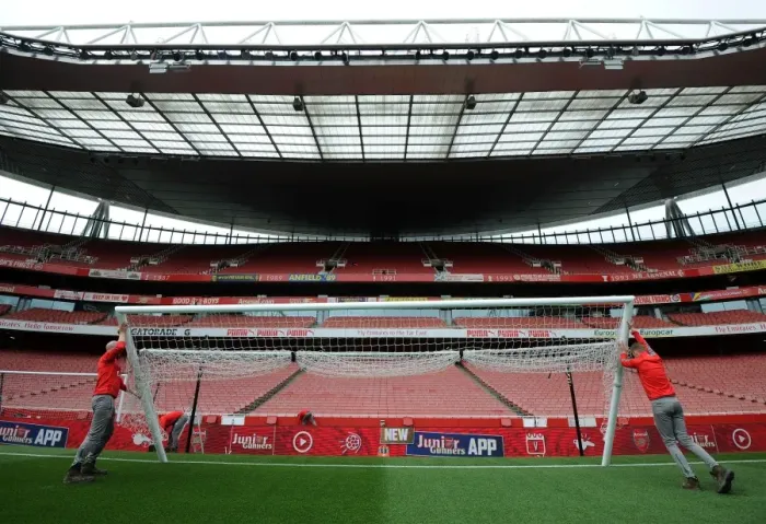 Framed Print : Arsenal Groundsman Prepares Emirates Stadium for Arsenal v Sunderland Premier League Match