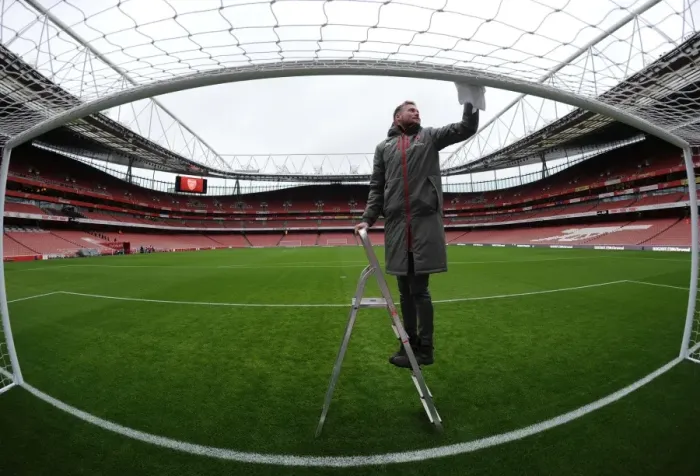 Framed Print : Arsenal Groundsman Prepares Emirates Stadium for Arsenal vs. Crystal Palace: Premier League Match Framed Print : Arsenal Groundsman Prepares Emirates Stadium for Arsenal vs. Crystal Palace: Premier League Match