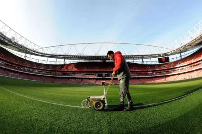 Framed Print : Arsenal Groundsman Prepares Emirates Stadium Pitch for Arsenal vs West Bromwich Albion (2016-17)