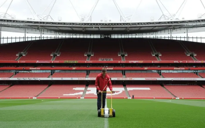 Framed Print : Arsenal Groundsman Prepares Emirates Stadium Pitch for Wigan Athletic Clash (2011-12) Framed Print : Arsenal Groundsman Prepares Emirates Stadium Pitch for Wigan Athletic Clash (2011-12)