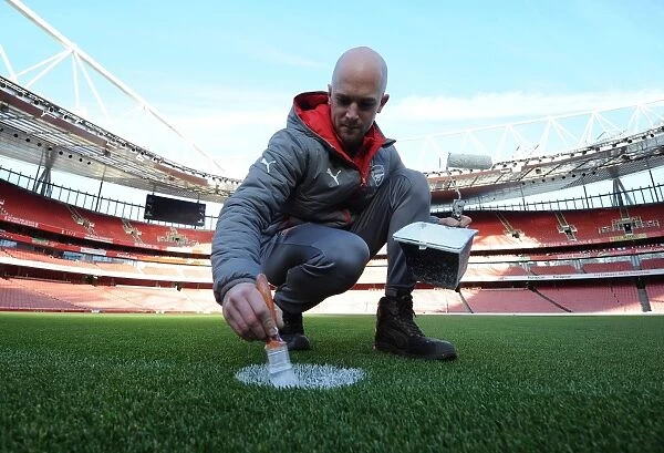 Arsenal: Groundsman Prepares Pitch for Arsenal v West Bromwich Albion (2016-17)