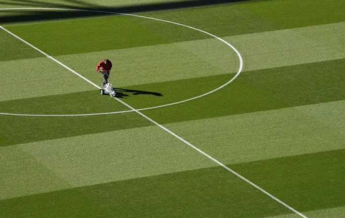 Framed Print : Arsenal: Groundsman Prepares Pitch for Carabao Cup Clash against Brentford