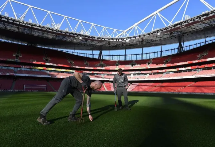 Framed Print : Arsenal Groundsmen Prepare Meticulously for Emirates Stadium Pitch Ahead of Arsenal v AFC Bournemouth Match