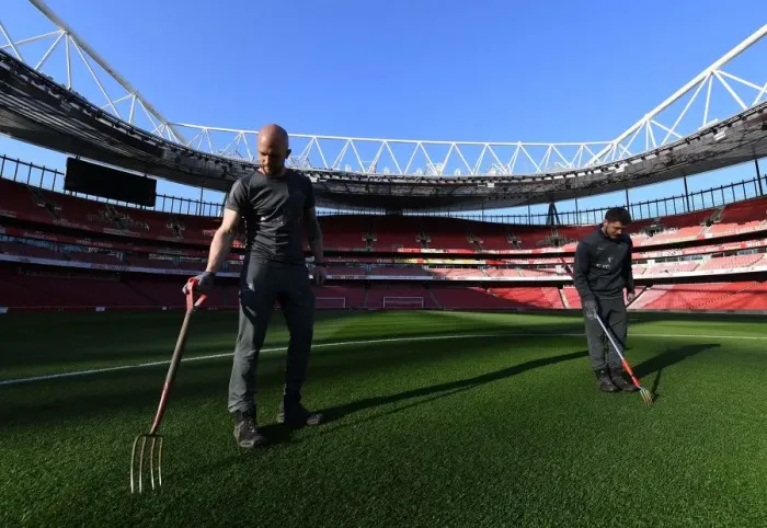 Framed Print : Arsenal: Groundsmen Prepare Meticulously Groomed Emirates Stadium Pitch for Arsenal v AFC Bournemouth