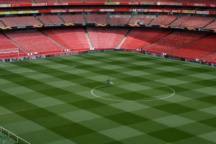 Framed Print : Arsenal: Groundsmen Ready the Pitch for Europa League Semi-Final Clash against Valencia