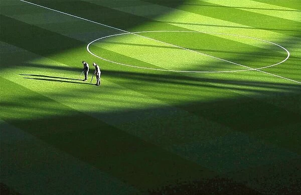 Arsenal Groundsmen's Meticulous Preparation for Emirates Stadium Pitch Ahead of Arsenal vs Bournemouth Match