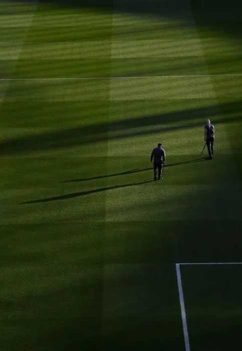 Framed Print : Arsenal Groundsmen's Meticulous Preparation for Emirates Stadium Pitch Ahead of Arsenal vs AFC Bournemouth