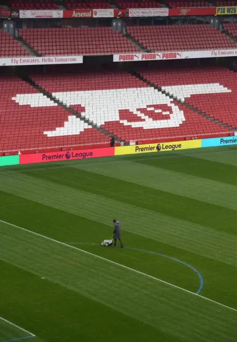 Framed Print : Arsenal Groundstaff Prepare Blue Turf for Premier League Match Framed Print : Arsenal Groundstaff Prepare Blue Turf for Premier League Match