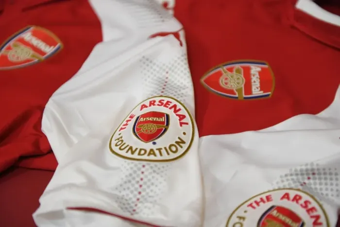 Framed Print : Arsenal Home Changing Room: Arsenal Foundation Shirts Before Arsenal vs Newcastle United, Premier League 2017-18