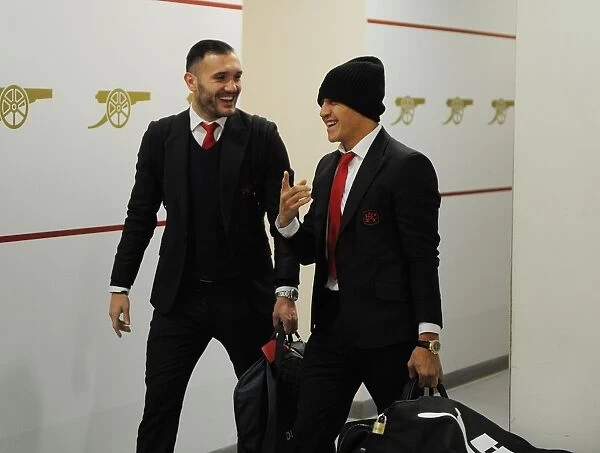 Arsenal Home Team: Lucas Perez and Alexis Sanchez in the Changing Room before Arsenal vs West Bromwich Albion (2016-17)