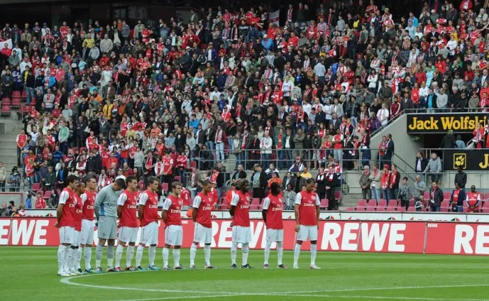 Framed Print : Arsenal Honors Victims of Norway Tragedy in Pre-Season Friendly Against Cologne