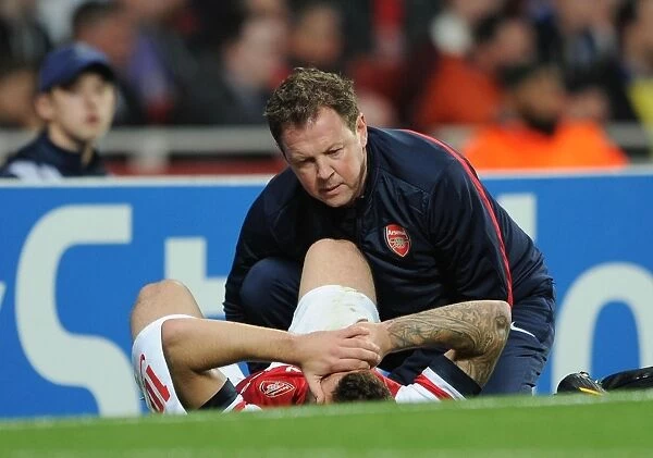 Arsenal: Jack Wilshere Receives Treatment from Colin Lewin vs Borussia Dortmund, UEFA Champions League (2013)
