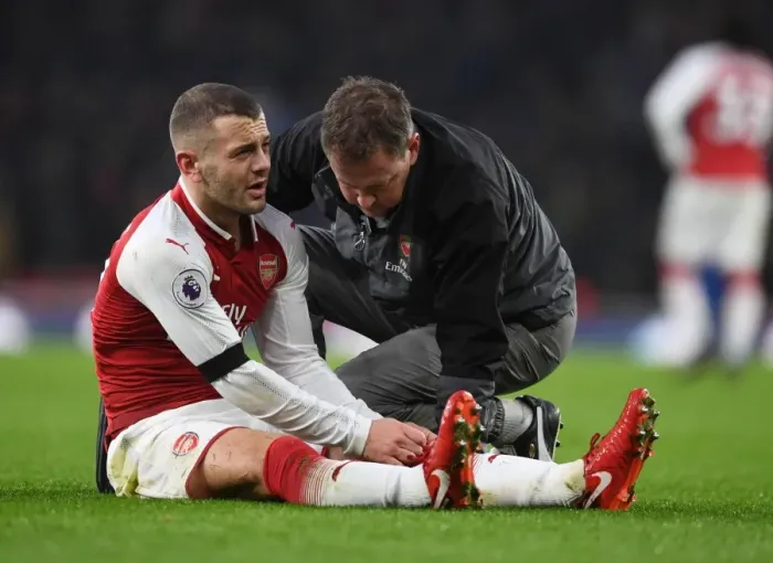 Framed Print : Arsenal: Jack Wilshere Receives Treatment from Physio Colin Lewin vs Crystal Palace, Premier League Framed Print : Arsenal: Jack Wilshere Receives Treatment from Physio Colin Lewin vs Crystal Palace, Premier League
