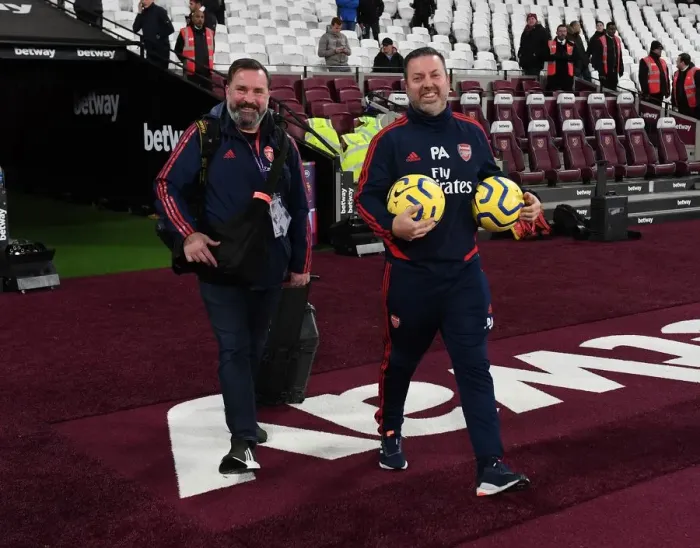 Framed Print : Arsenal Kitman and Photographer Prepare for West Ham Clash - Premier League 2019-20 Framed Print : Arsenal Kitman and Photographer Prepare for West Ham Clash - Premier League 2019-20