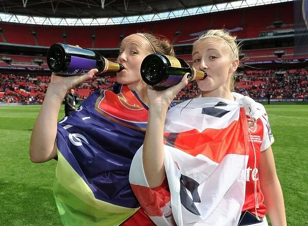 Arsenal Ladies Celebrate FA Cup Victory: Casey Stoney and Leah Williamson Rejoice after Winning at Wembley Stadium