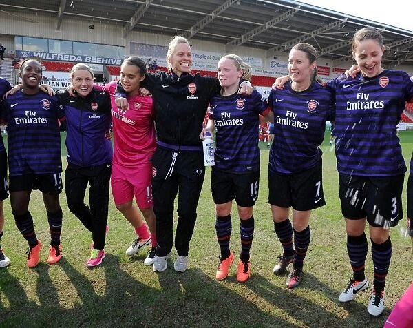Arsenal Ladies Celebrate FA Cup Victory: A Triumphant Moment with Danielle Carter, Kelly Smith, Rebecca Spencer, Shelley Kerr, Kim Little, Ciara Grant, and Yvonne Tracy