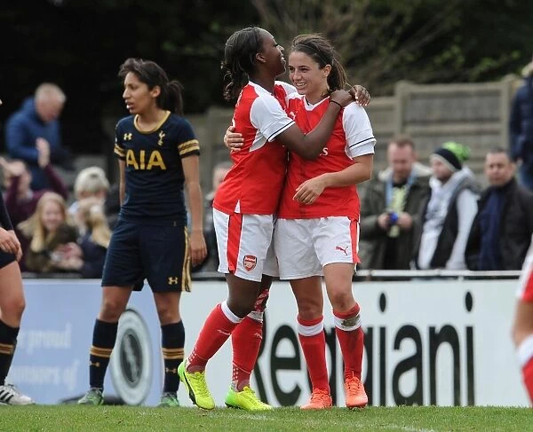 Arsenal Ladies Celebrate Goal: Carter and Van de Donk's Strike against Tottenham Hotspur in FA Cup