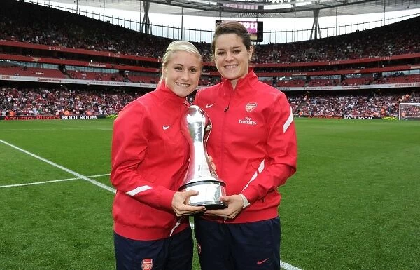 Arsenal Ladies Celebrate WSL Triumph: Steph Houghton and Jennifer Beattie with the Trophy at Emirages, Arsenal 1:0 Swansea City