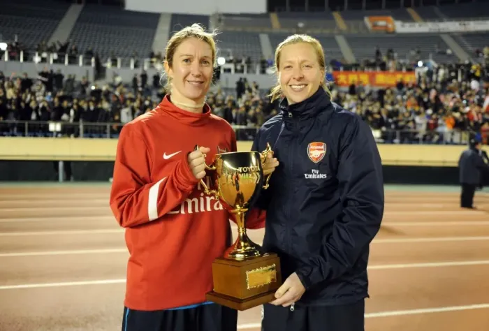 Framed Print : Arsenal Ladies and INAC Kobe Draw in Charity Match at Nishigaoka Stadium, Tokyo (30 / 11 / 11): Celebrating with the Trophy (Ciara Grant and Jayne Ludlow)