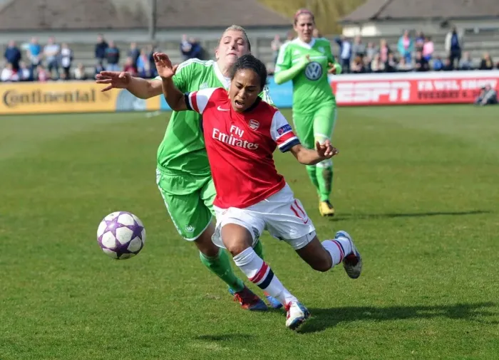 Framed Print : Arsenal Ladies vs. VfL Wolfsburg: Rachel Yankey Fouls by Luisa Wensing in UEFA Women's Champions League Semi-Final Framed Print : Arsenal Ladies vs. VfL Wolfsburg: Rachel Yankey Fouls by Luisa Wensing in UEFA Women's Champions League Semi-Final