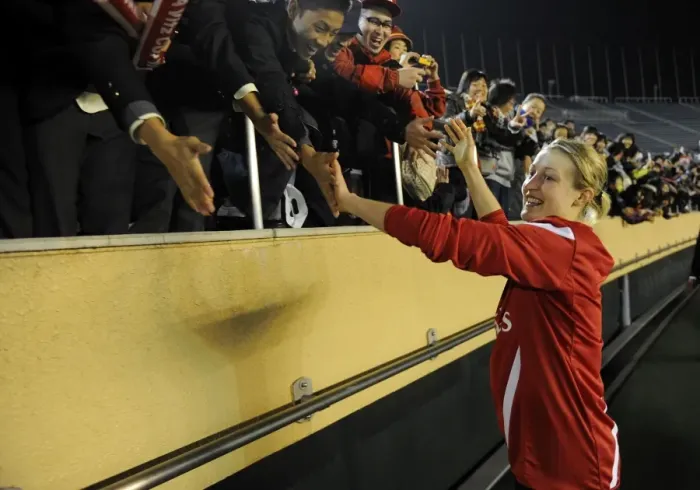 Framed Print : Arsenal Ladies vs. INAC Kobe: A 1-1 Charity Battle - Ellen White's Inspiring High-Five with Fans