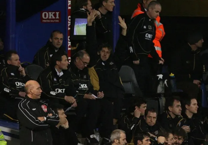 Framed Print : Arsenal legend and Portsmouth coach Tony Adams salutes the Arsenal fans during the match