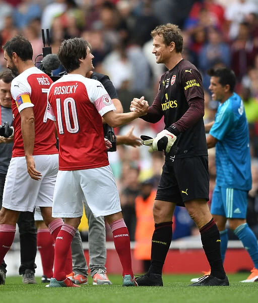 Arsenal Legends: Jens Lehmann and Tomas Rosicky Reunite on the Emirates Field against Real Madrid Legends