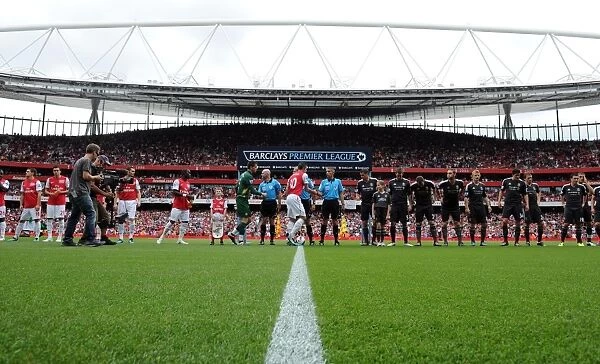 Arsenal and Liverpool line up before the match. Arsenal 0: 2 Liverpool. Barclays Premier League