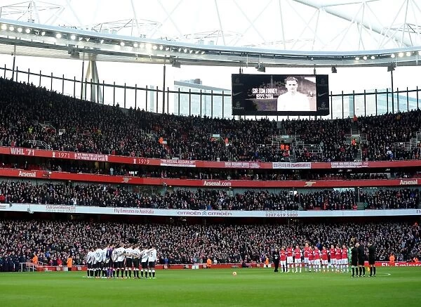 Arsenal and Liverpool teams line up for the minutes silence for Tom Finney. Arsenal 2: 1 Liverpool