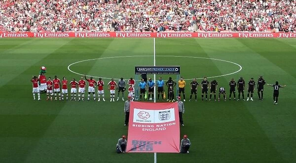 The Arsenal and Man City teams line up behiind Back the bid banner. Arsenal 0
