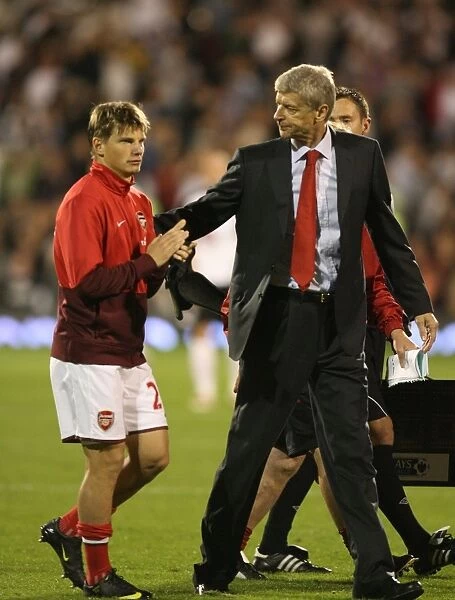 Arsenal manager Arsene Wenger with Andrey Arshavin