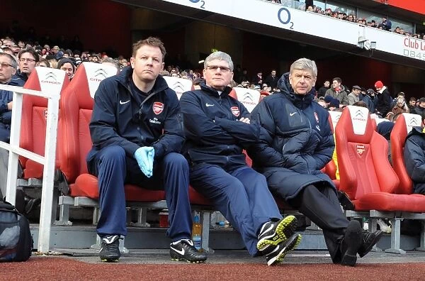 Arsenal manager Arsene Wenger with assistant manager Pat Rice and physio Colin Lewin