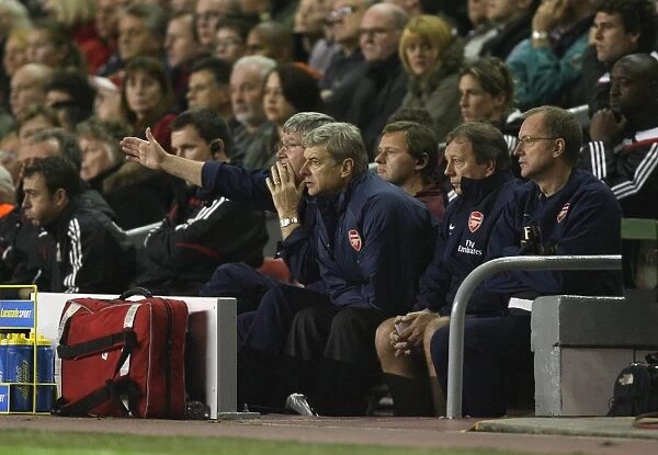Arsenal manager Arsene Wenger with assistant Pat Rice