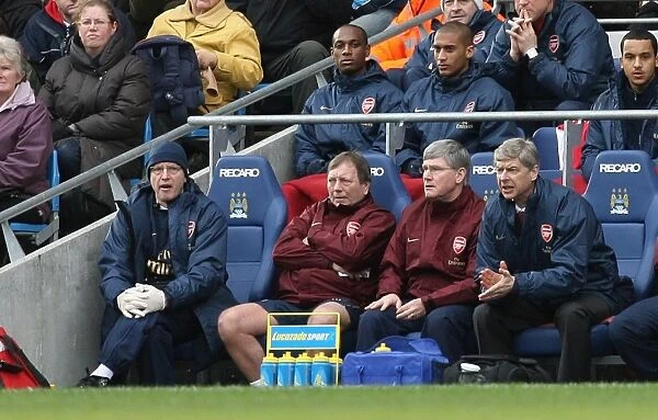 Arsenal manager Arsene Wenger assistant Pat Rice and kit manager Vic Akers