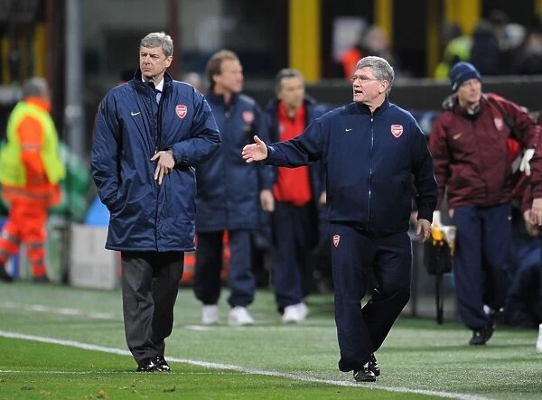 Arsenal manager Arsene Wenger and assistant Pat Rice