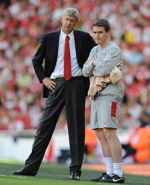 Arsenal manager Arsene Wenger with Doctor Gary O Driscoll