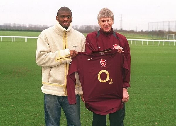Arsenal manager Arsene Wenger with New signing Abou Diaby