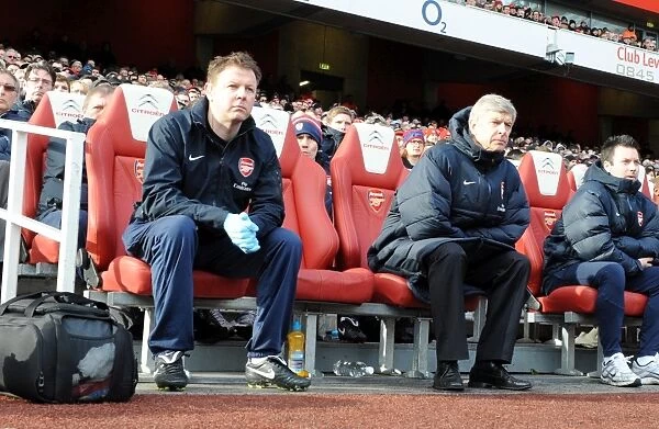 Arsenal manager Arsene Wenger with physio Colin Lewin. Arsenal 2: 1 Huddersfield Town