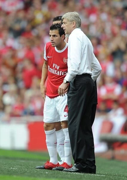 Arsenal manager Arsene Wenger with substitute Cesc Fabregas. Arsenal 6: 0 Blackpool